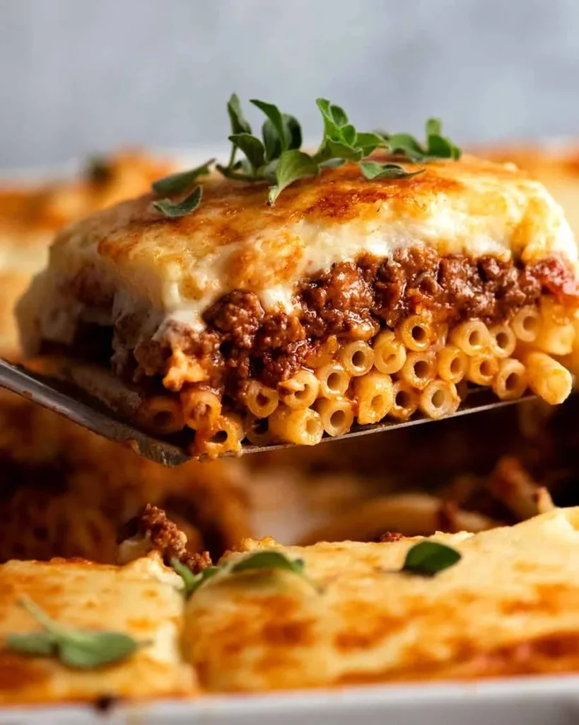Delicious homemade pastitsio, a Greek pasta bake with layers of pasta, meat, and béchamel sauce.