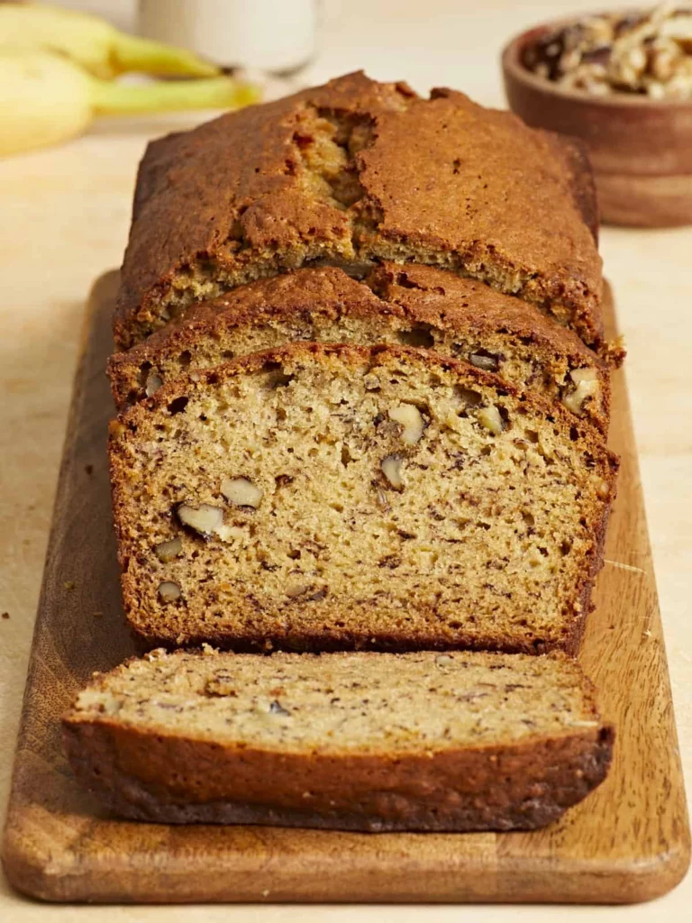 Freshly baked homemade banana bread cooling on a wire rack