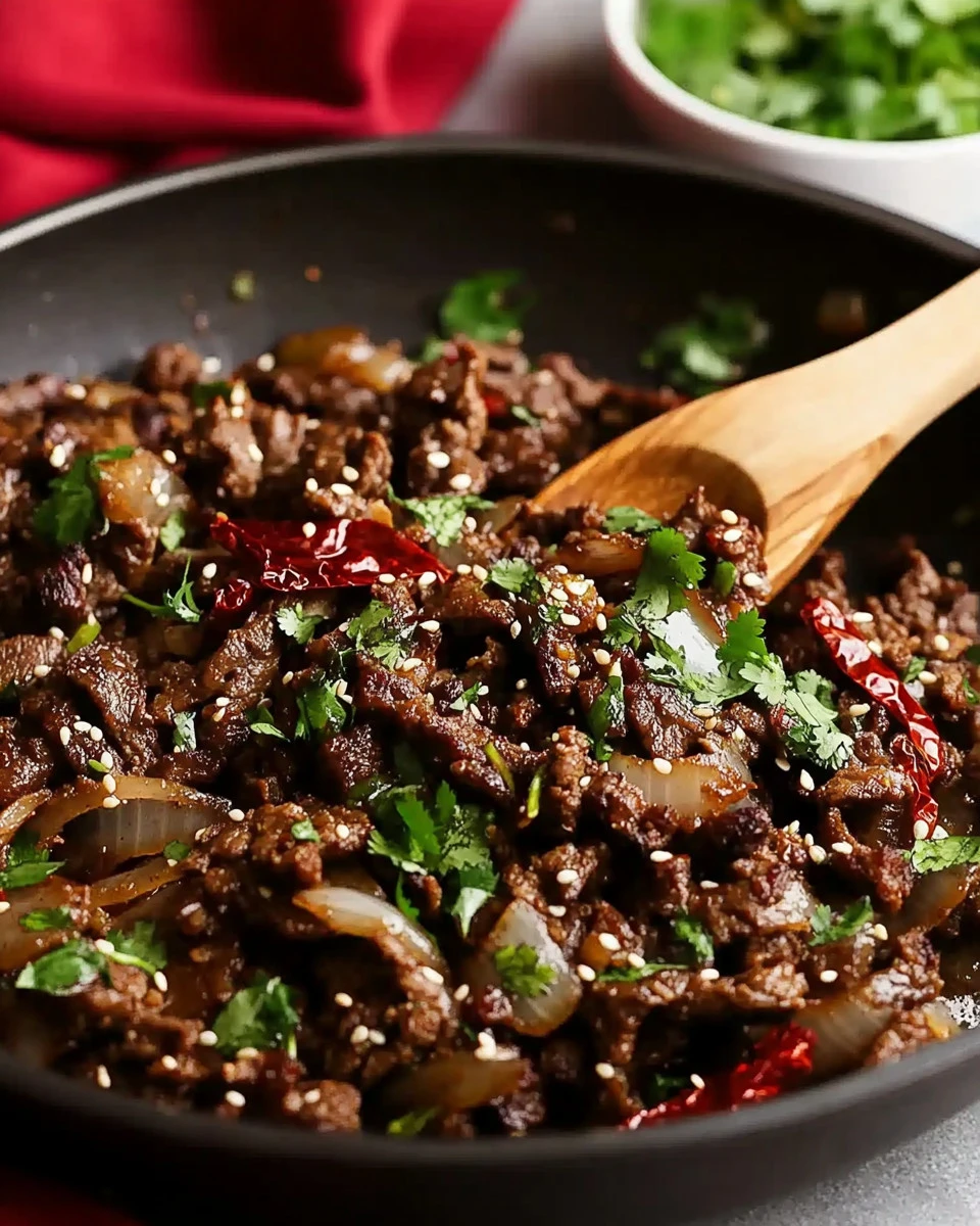 Delicious Xinjiang Cumin Lamb Stir Fry with vibrant vegetables and aromatic spices