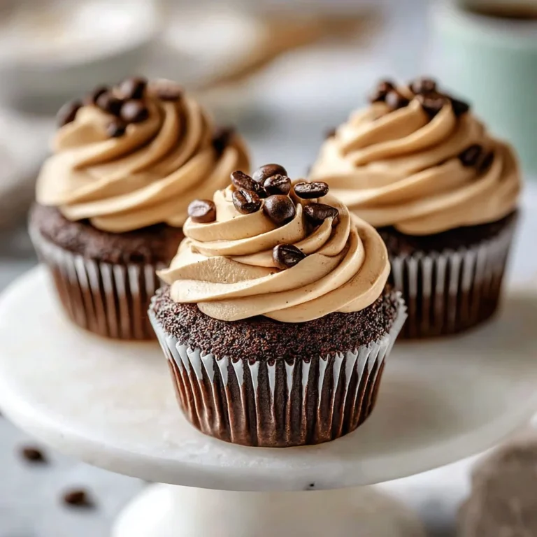Delicious espresso cupcakes with creamy espresso frosting on a rustic table