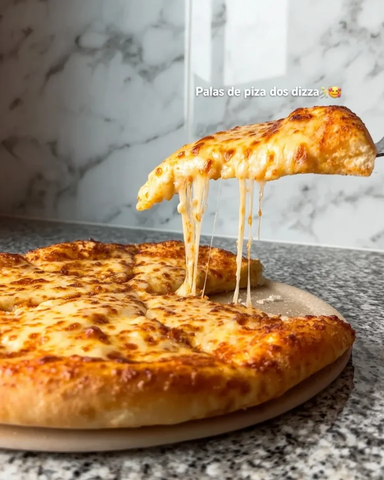 A freshly baked homemade pizza with colorful toppings and melted cheese